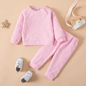 2pcs Baby Girl Solid Floral Embossed Long-sleeve Top and Pants Set
