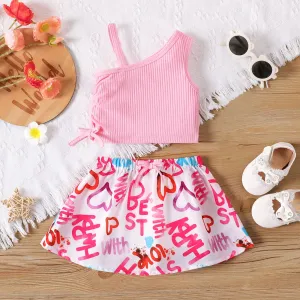 2pcs Baby Girl Cotton Ribbed One Shoulder Tank Crop Top and Allover Heart & Letter Print Skirt Set