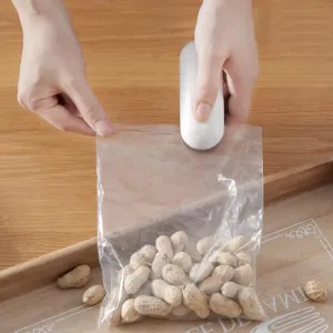 Portable Handheld Mini Sealing Machin Household Travel Hand Pressure Heat Sealing Sealing Machine for Snack Bags Food Saver Storage
