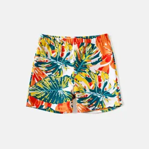 Family Matching Allover Plant Print Spliced Solid Ruffle Trim One-Piece Swimsuit and Swim Trunks #226477