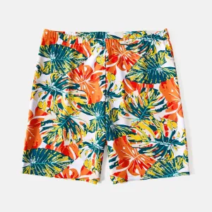 Family Matching Allover Plant Print Spliced Solid Ruffle Trim One-Piece Swimsuit and Swim Trunks #226493