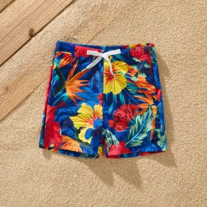 Family Matching Solid Scallop Trim Strappy Two-piece Swimsuit or Allover Floral Print Swim Trunks Shorts #854183